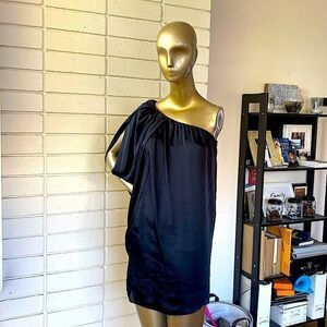 Black silky one shoulder mini dress. Ruched side , side zip, 100% polyester